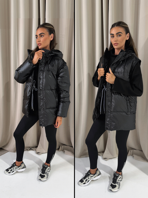 Black DISCOVERY 2 IN 1 Down Feather Coat worn and unzipped over black fleece, styled with black leggings