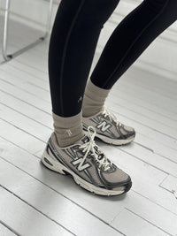 Base Cotton Rib Sock in Elephant grey, worn with sneakers and black leggings
