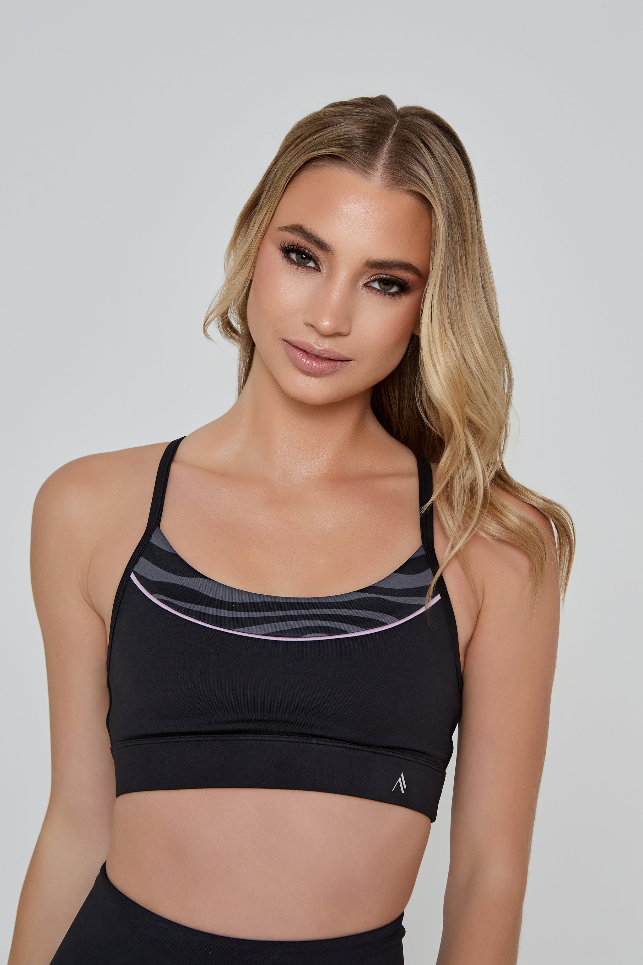 Model wears ENERGISE SPORTS BRA 