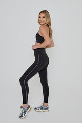 Model wears ENERGISE LEGGINGS 