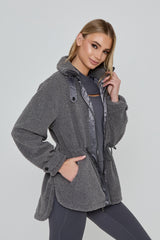 Model wears FREEDOM SHERPA JACKET in grey 