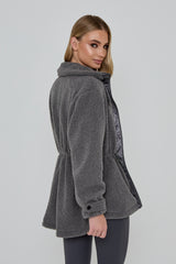 Model wears FREEDOM SHERPA JACKET in grey 