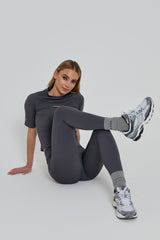 model wears branded ULTRA RIB cotton socks in grey 