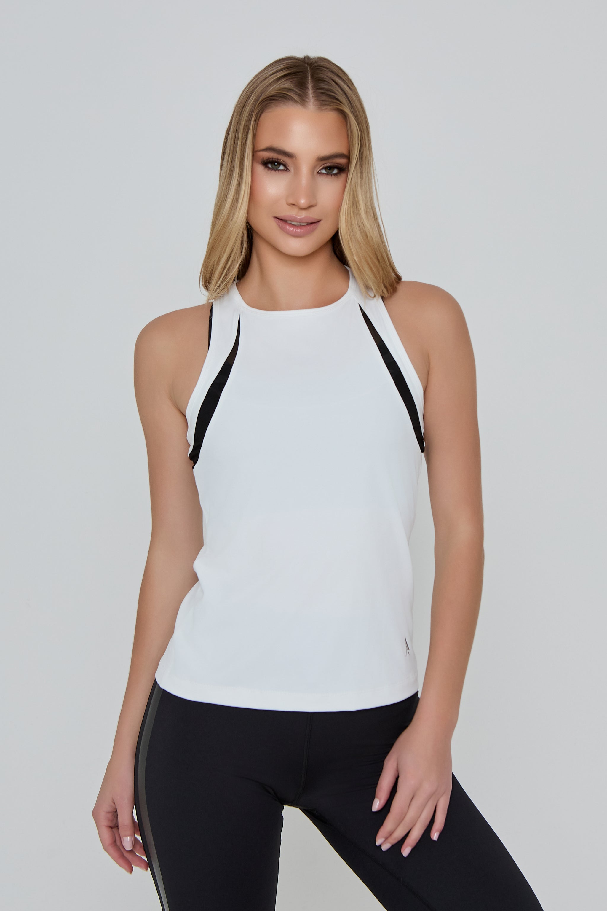 Model wearing DYNAMIC SPORTS VEST in white 