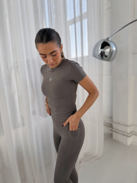 DEFINE SCULPT TEE in Truffle, fitted short-sleeve tee worn with matching leggings