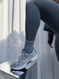 Active Crew Sock in Turbulence grey worn with running shoe, close-up detail view
