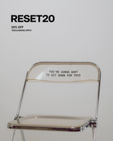 Clear chair with text on a gray background, featuring a promotional message.